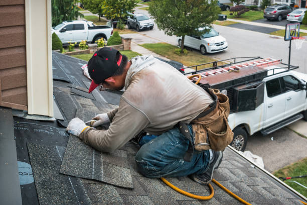 Professional Roof Replacement technician working in Iola, TX